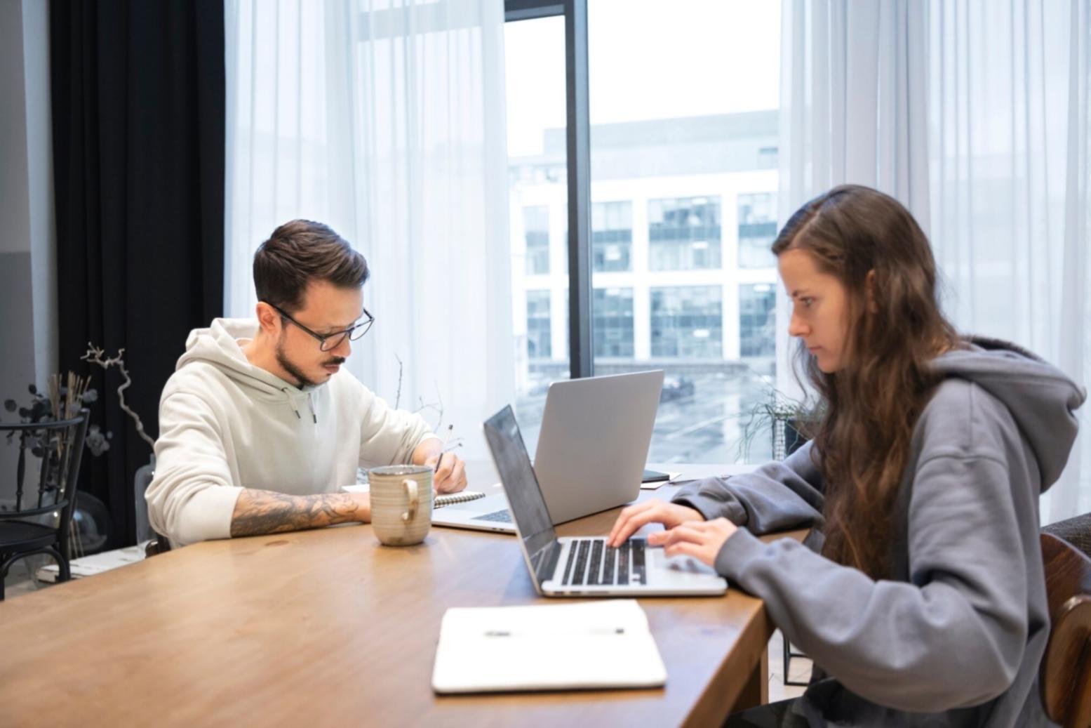 Workshop session with financial statements spread across work table