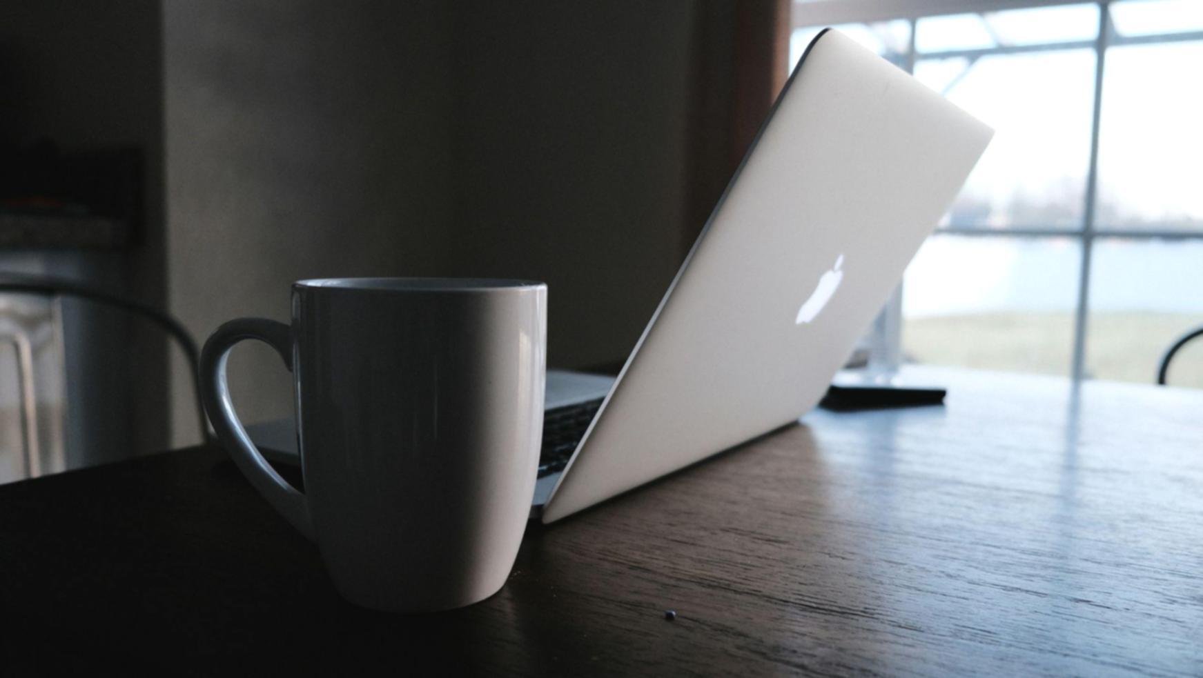 Students reviewing actual company reports during class discussion